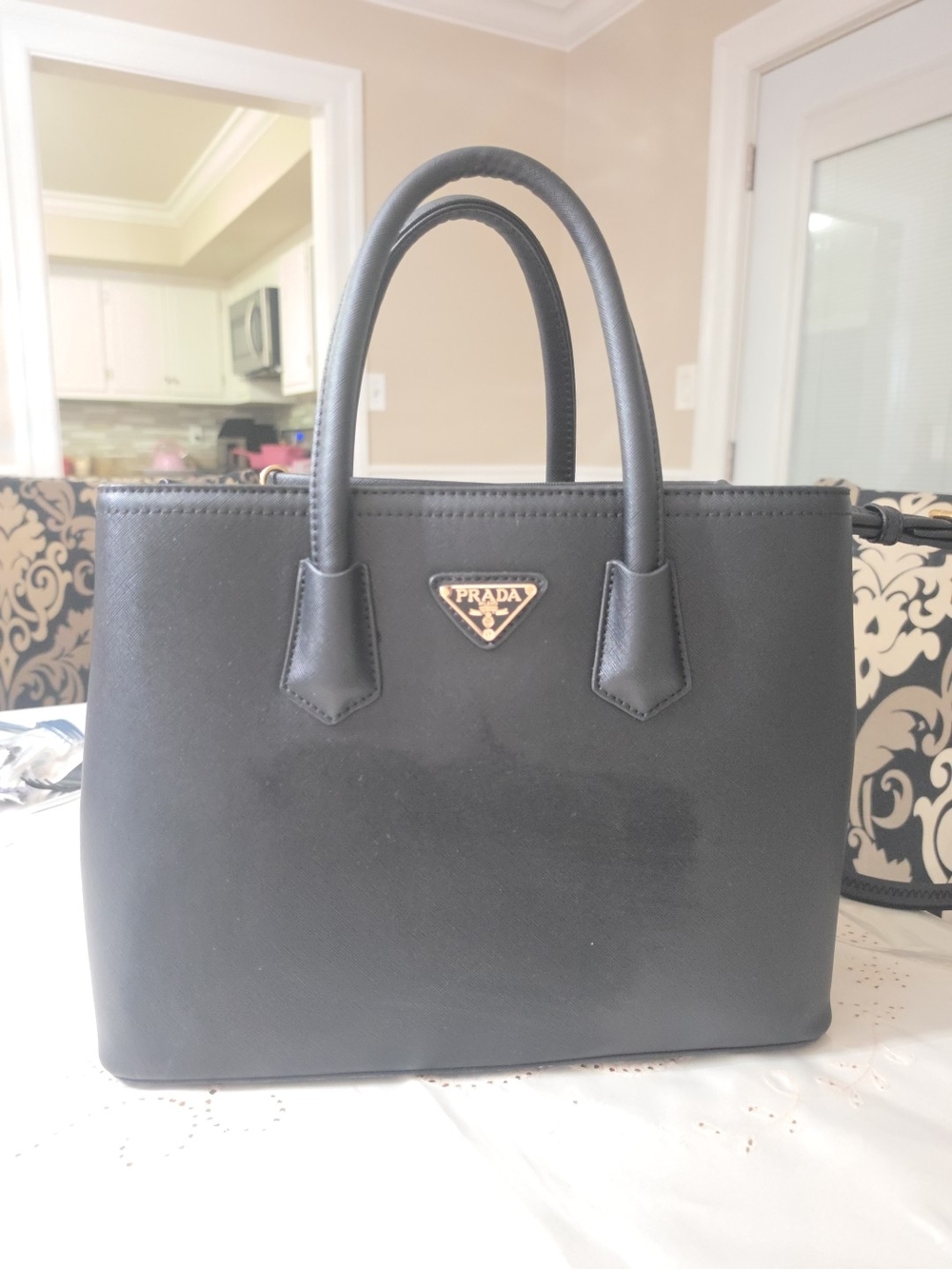 Prada Black Leather Top-Handle Tote with Gold Logo Plaque